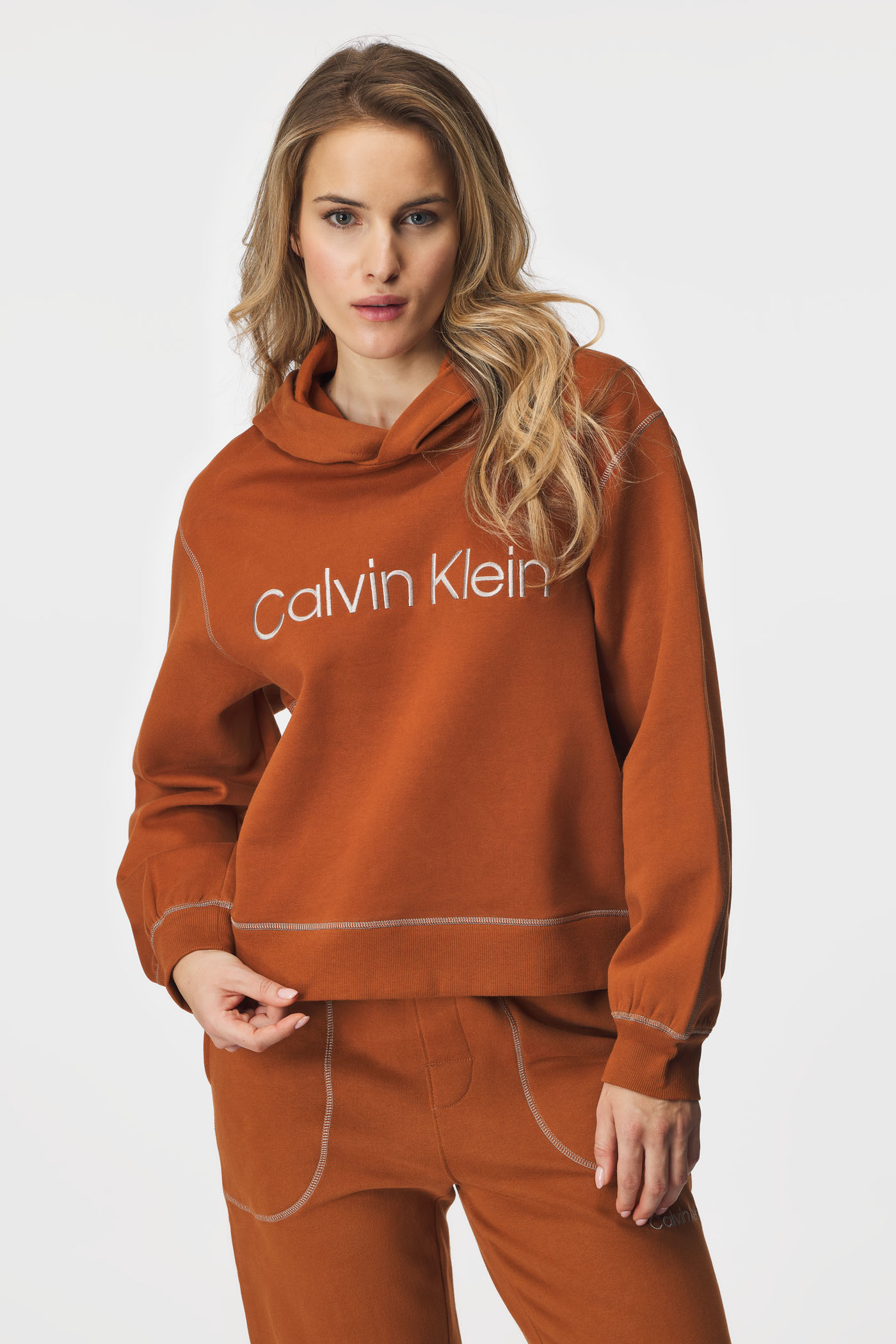 Športna jopica Calvin Klein Copper s kapuco